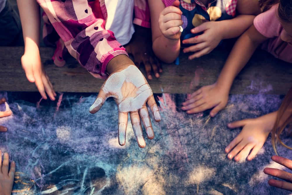 Group of Diverse Kids Hands with Chalk Paint