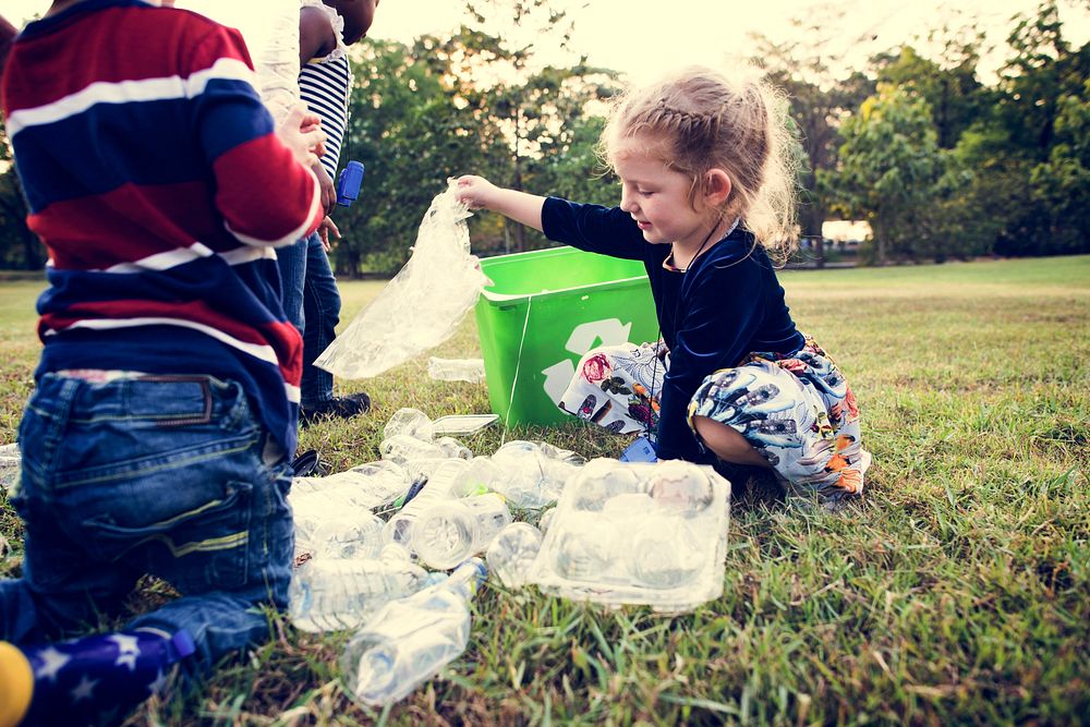 Little Kids Separating Recycle Plastic to Trash Bin