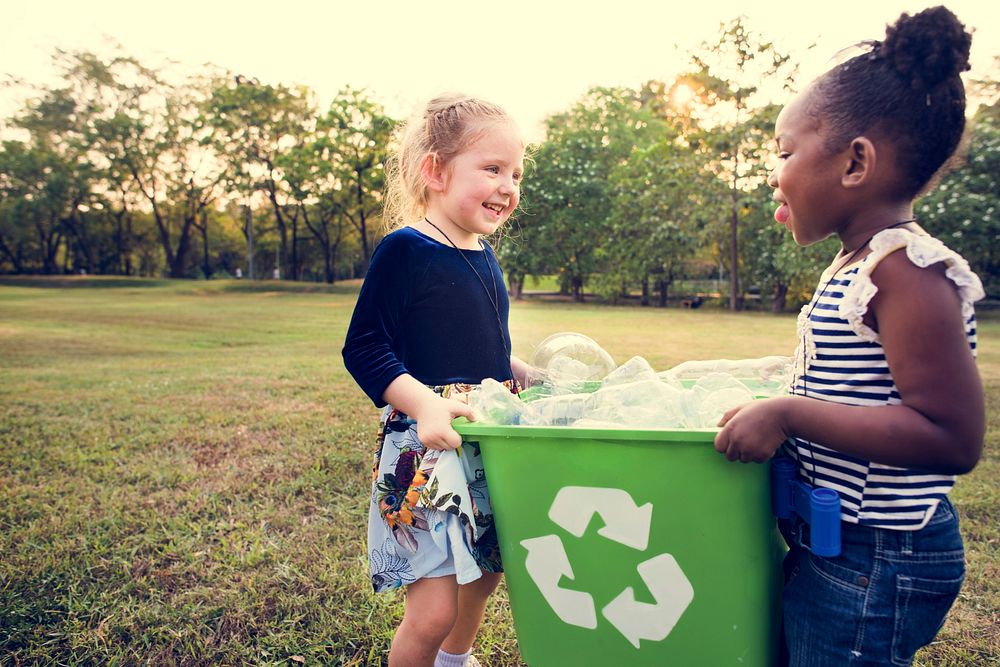 Little Kids Separating Recycle Can to Trash Bin