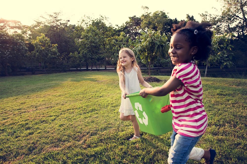 Little Kids Separating Recycle Can to Trash Bin