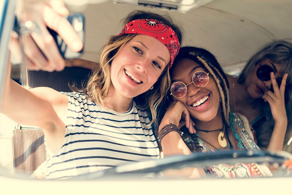 Group of Diverse Friends on Road Trip Taking Selfie Together