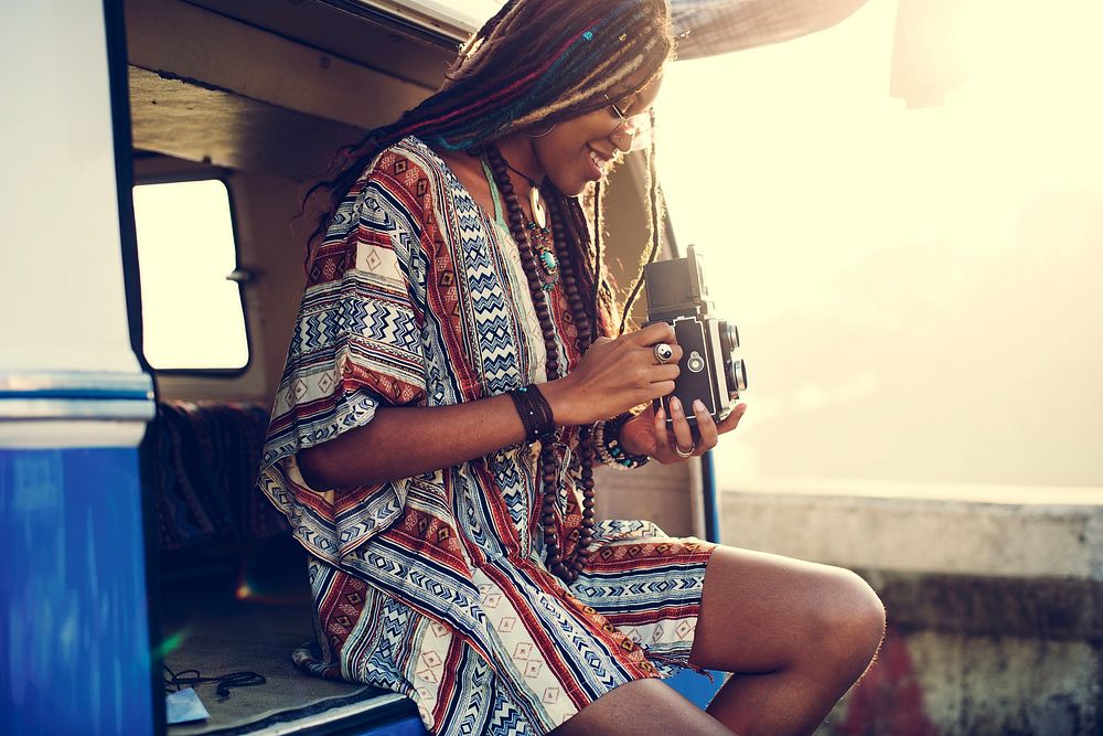 Woman Sitting with Camera Taking Snap Shoot Photo in a  Van