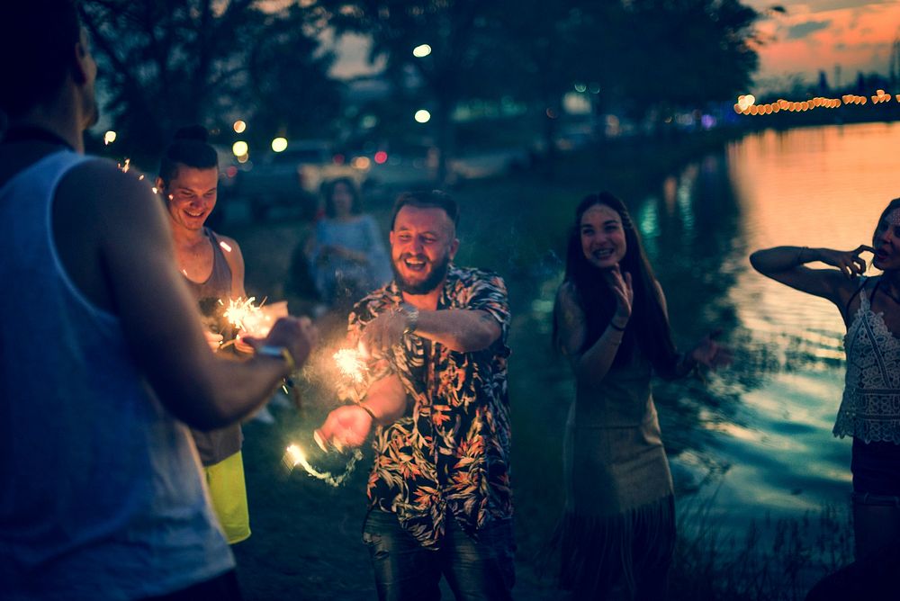People Enjoying Sparkler in Festival Event
