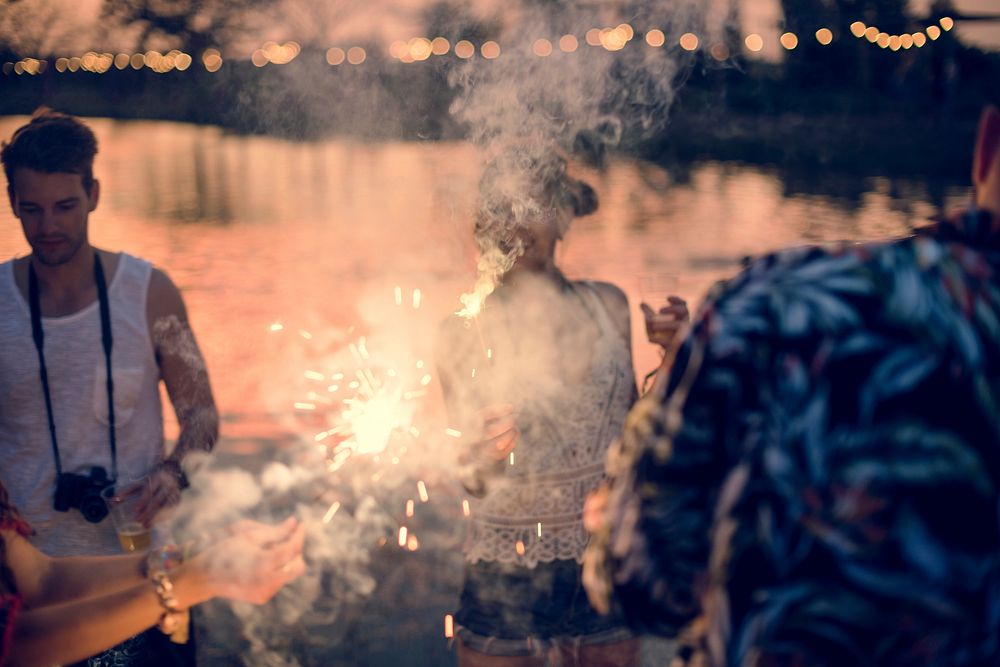 People Enjoying Sparkler in Festival Event