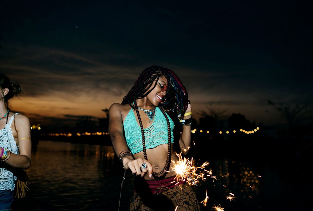 Woman Enjoying Sparkler in Festival Event
