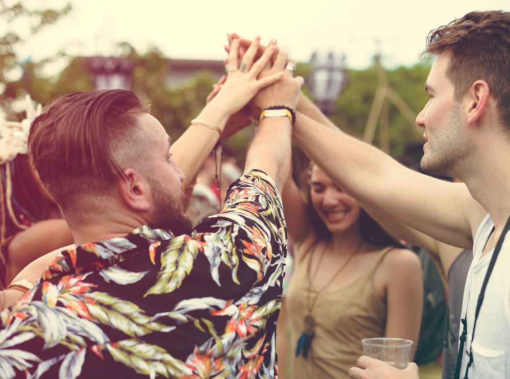 Friends Hands Together Unity at Festival Event