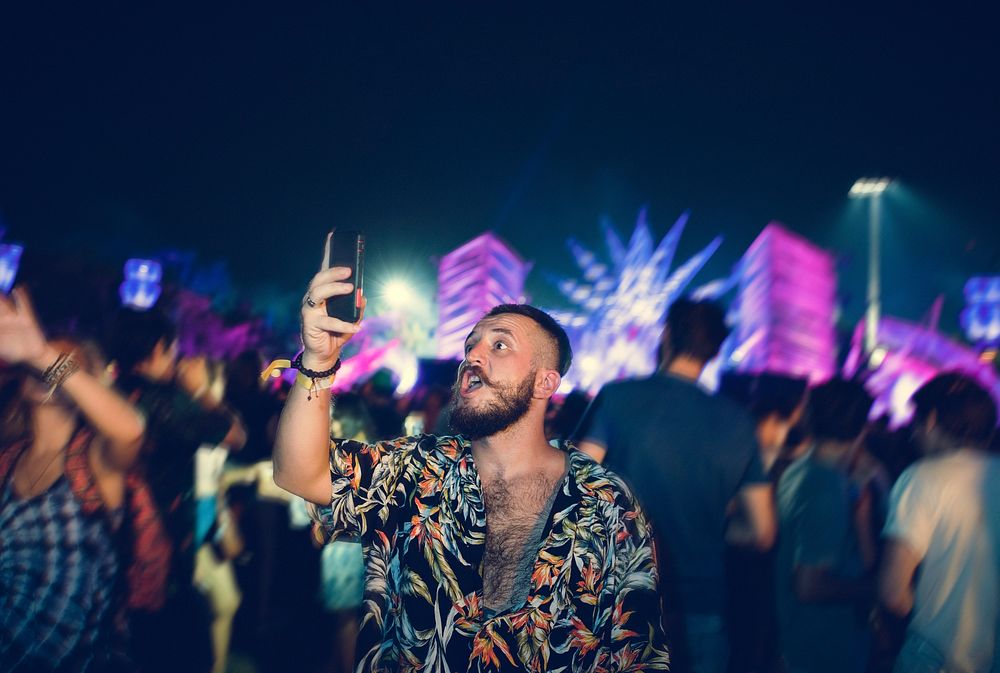 Man with Beers Enjoying Music Festival