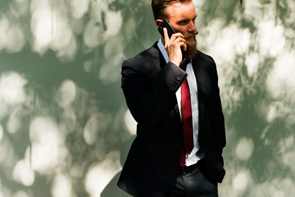 Businessman using mobile phone communication technology