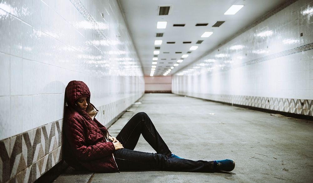 Adult Woman Sitting Hopeless on The Floor