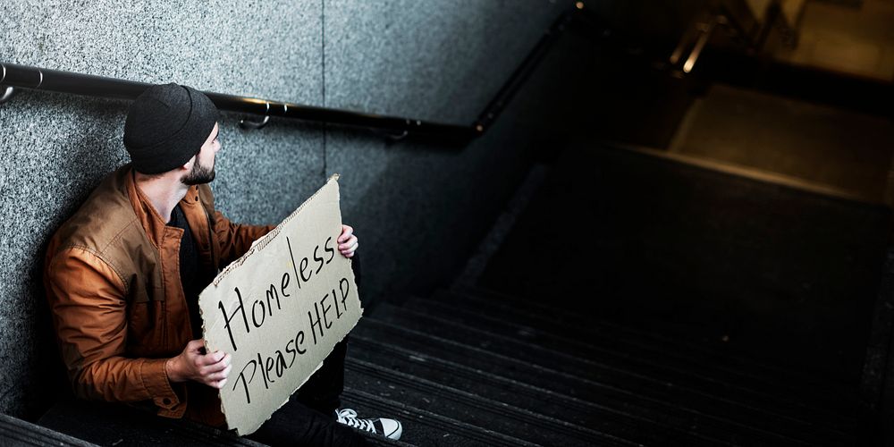 Homeless Man Asking For Help Sitting on Stairway Sidewalk