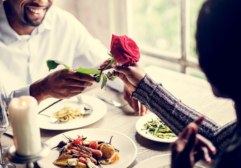 Romantic red rose on a dinner date