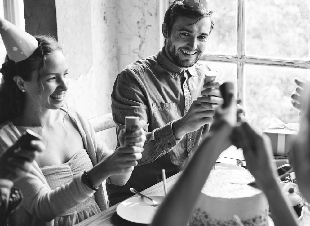 People Using Party Popping on Friend Birthday Celebration