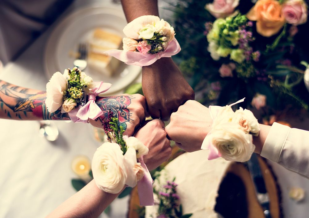 Bridesmaids Showing Flower Bouquets on their Writst
