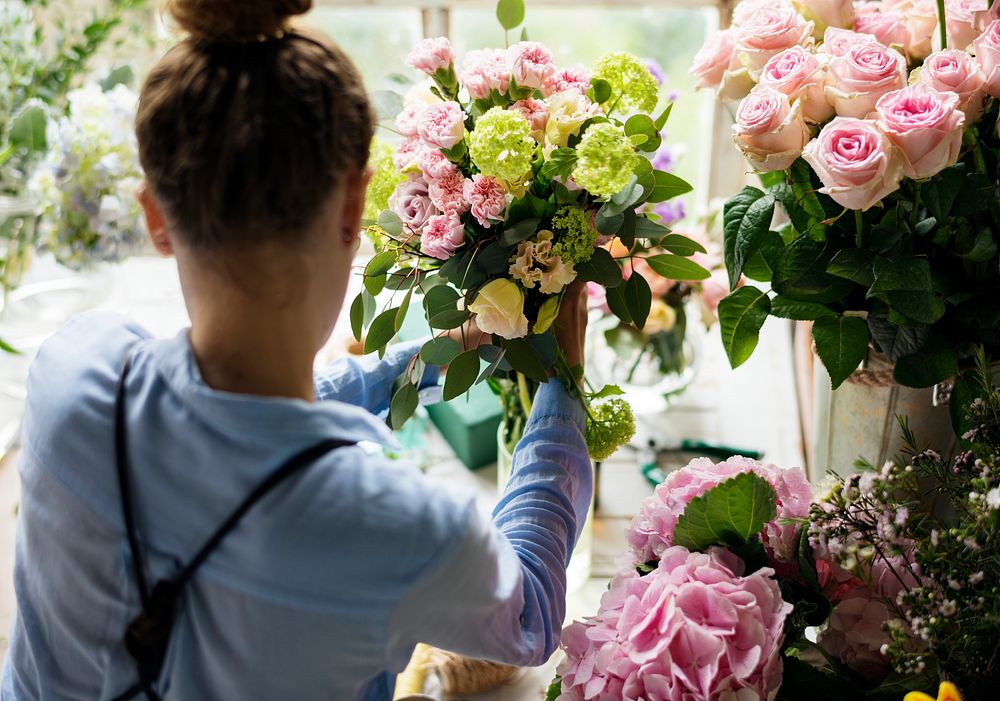 Close up florist flower arrangement skill