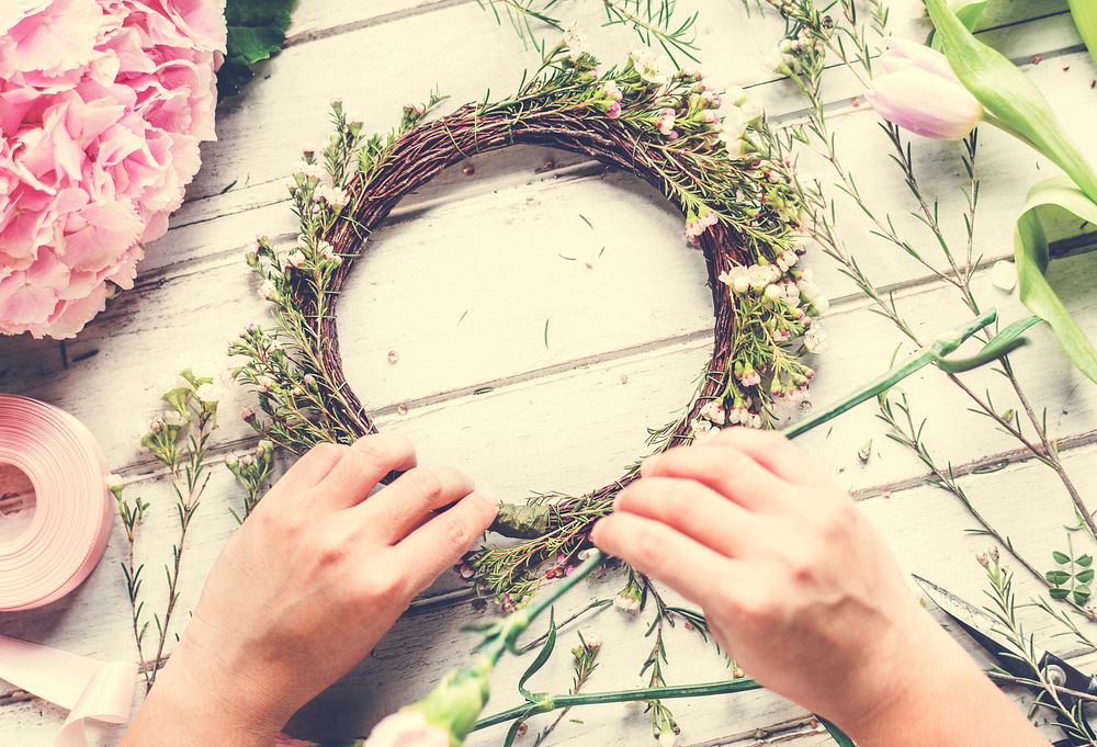 Florist Making Fresh Flowers Crown Arrangement