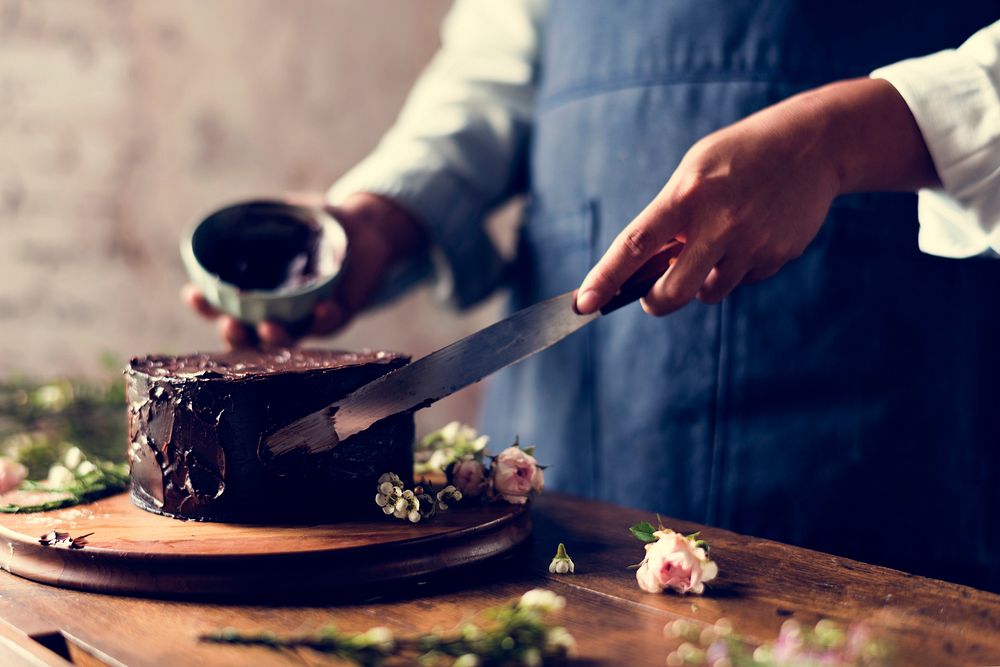 Baker Man Using Spatula Making Chocolate Cake