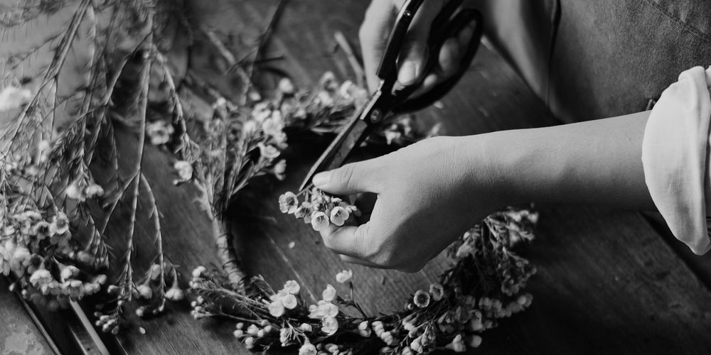 Florist Making Fresh Flowers Crown Arrangement