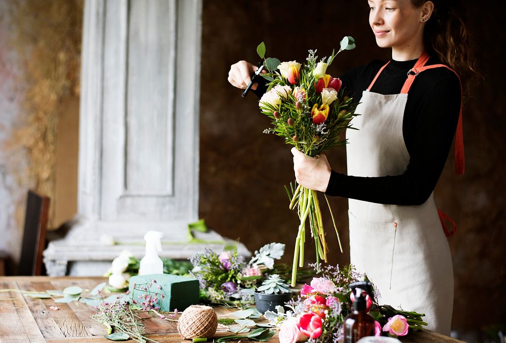 Woman florist flower arrangement workshop