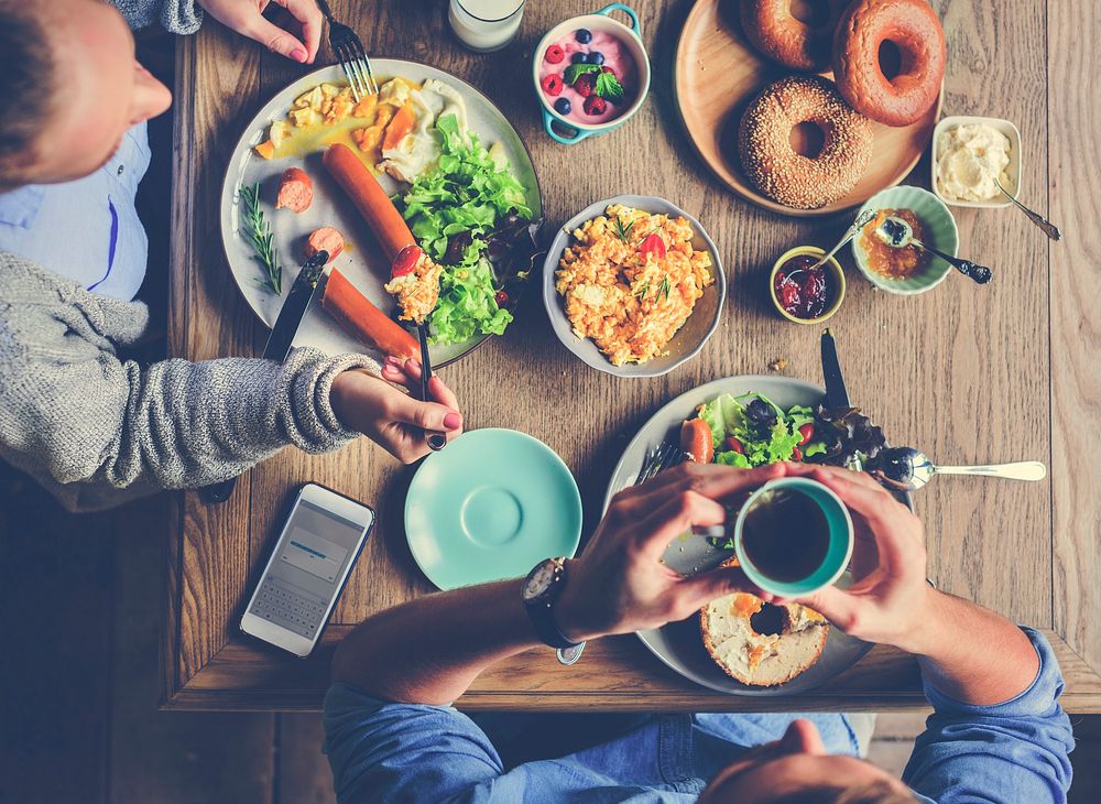 People Couple Having Breakfast Meal Together