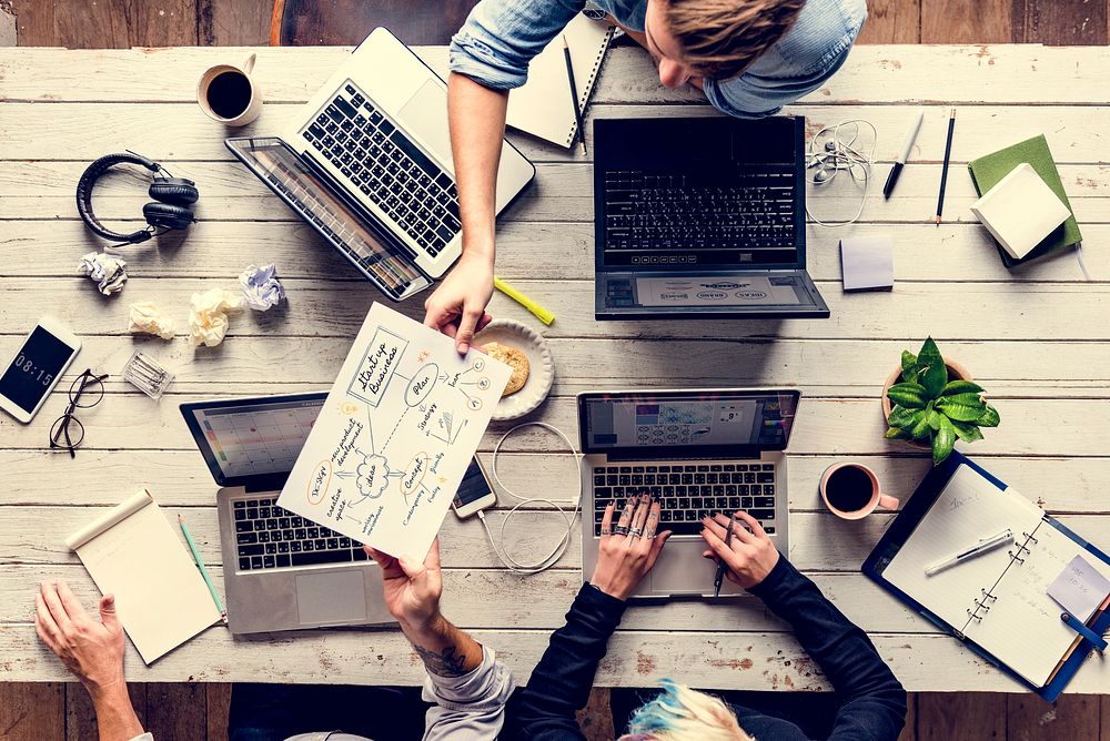 Group of people meeting and planning startup business