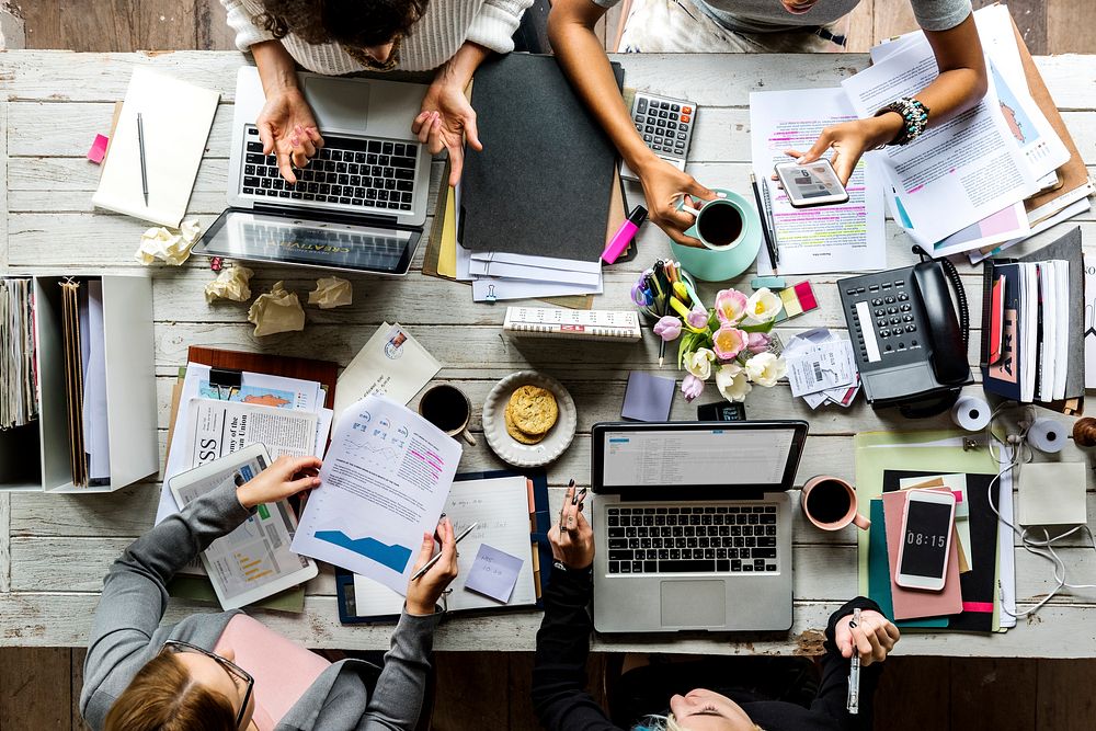 Business team working at workspace in aerial view