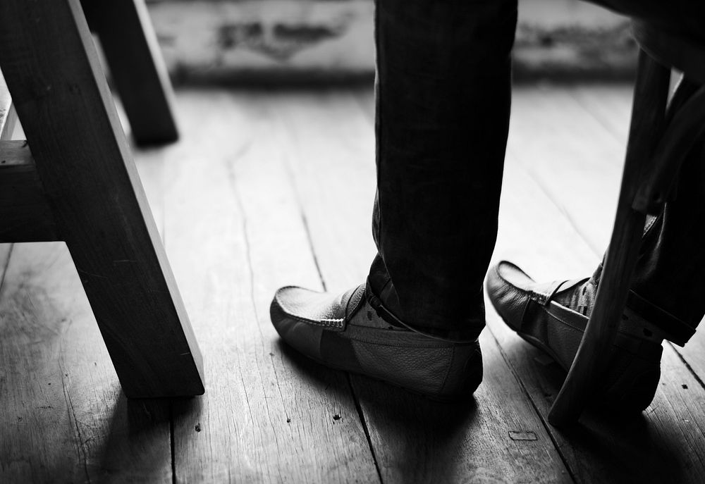 Adult Man Legs Feet by the Wooden Floor