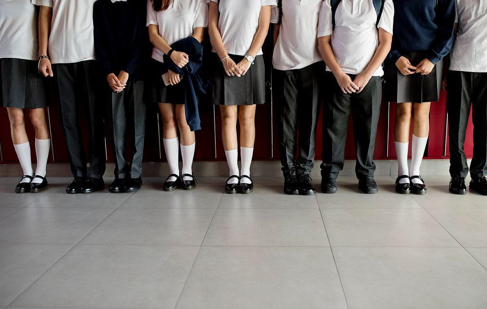 Group of students standing together on the hallway
