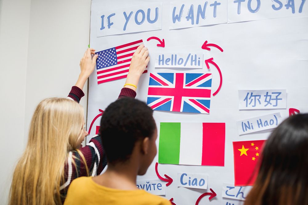 High school students working on international flags board