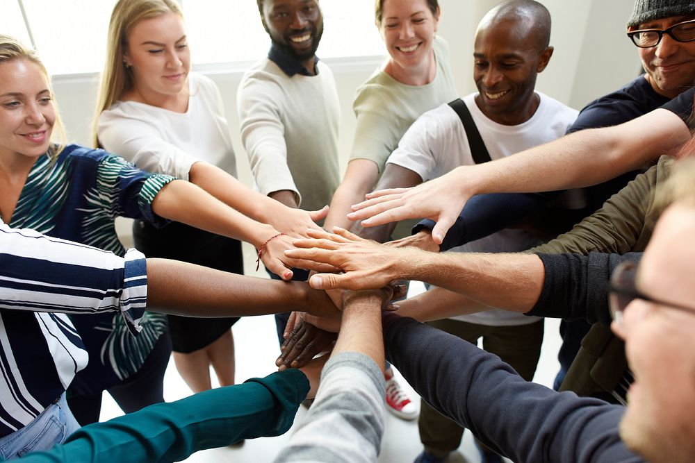 Diversity teamwork with joined hands | Premium Photo - rawpixel