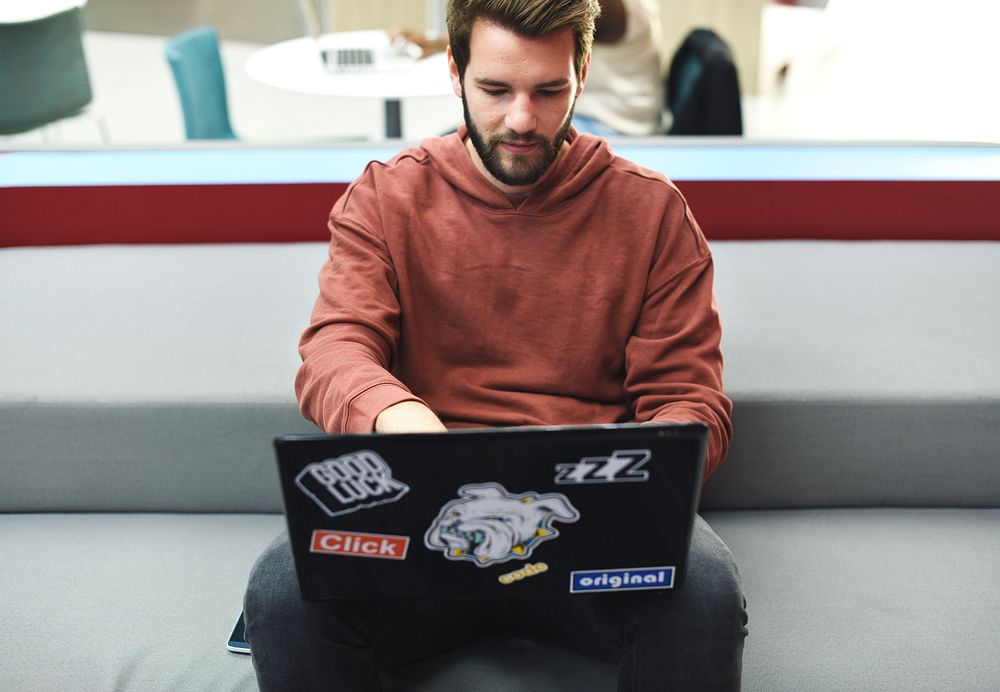 Caucasian man using computer laptop