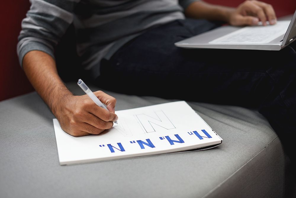 Man writing on a paper