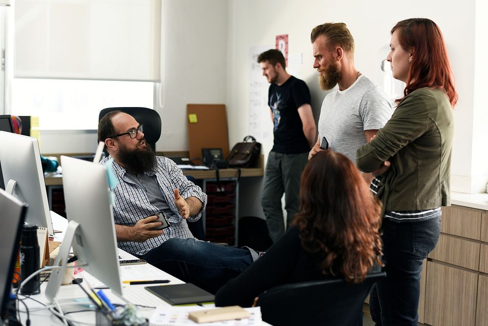 Group of diverse people attending startup business course