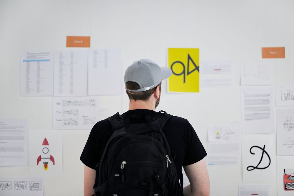 Startup Business People Looking on Strategy Board Information Thoughtful