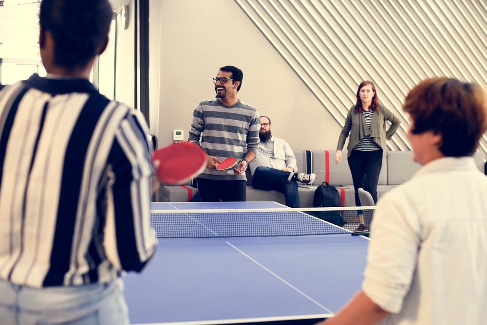 Startup Business People Playing Table Tennis Together During Bre
