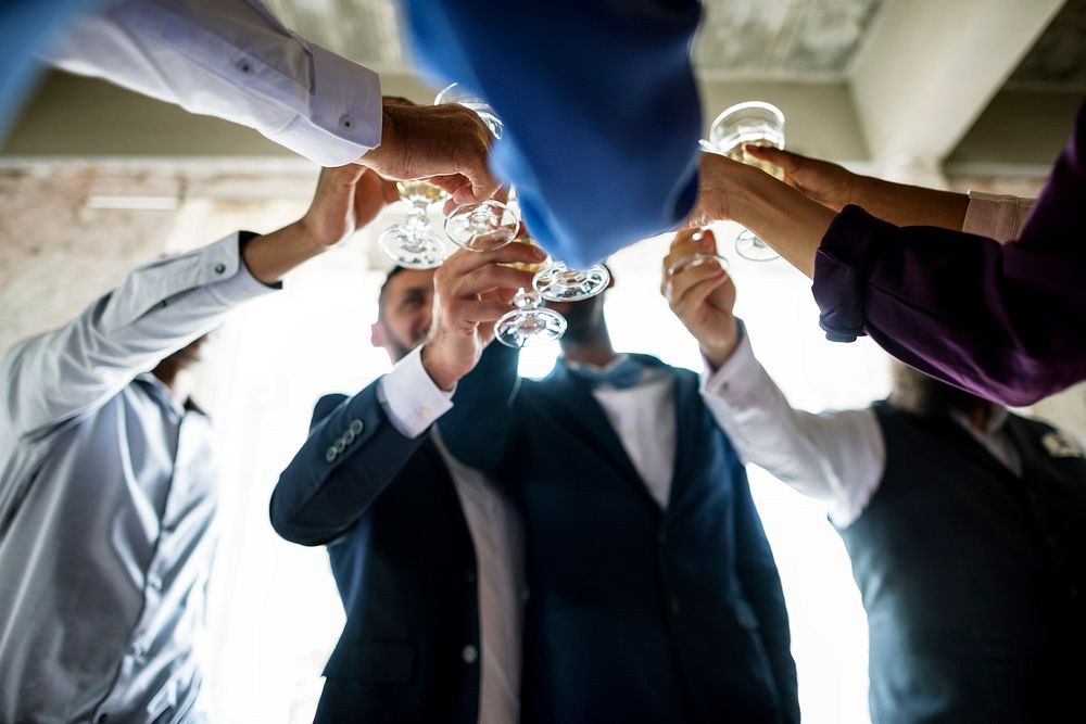 Group of Diverse People Clinking Wine Glasses Together Congratulations Celebration