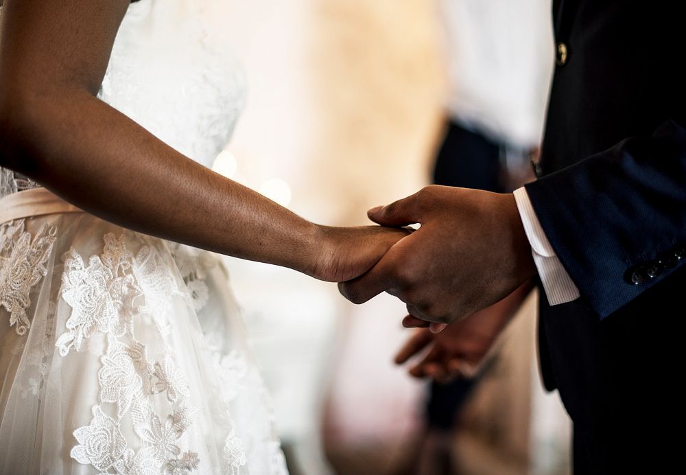 Newlywed African Descent Couple Holding Hands Together Love