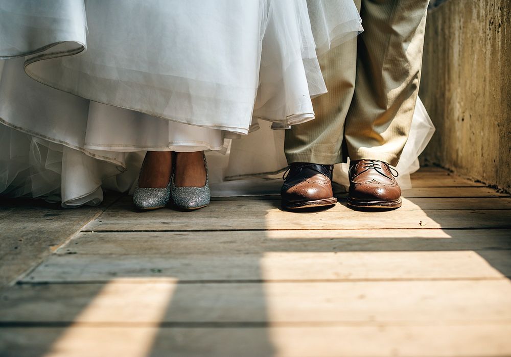 Bride and Groom Feet Standing on Wooden Floor
