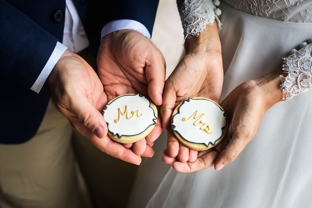 Newlywed Couple Hands Holding Showing Cookies Wedding Celebration
