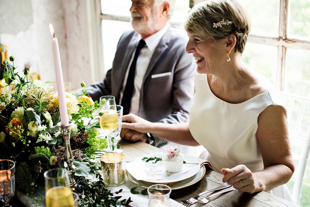 Senior Couple Sitting Cheerful Together Anniversary Celebration