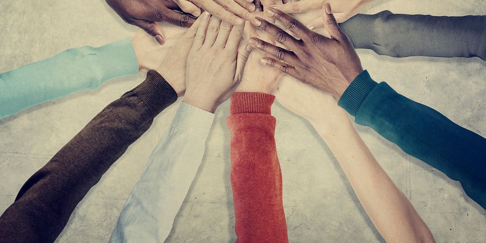 People Hands Together Unity Team Cooperation Concept