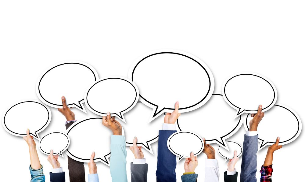 Group of Business Hands Holding Speech Bubble
