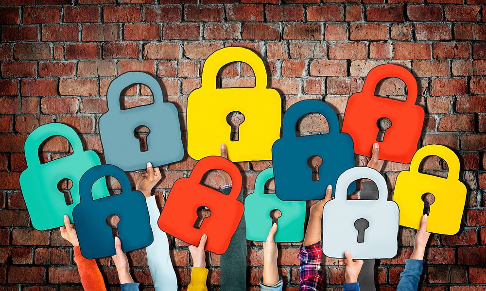 Group of Hands Holding Padlock Symbols