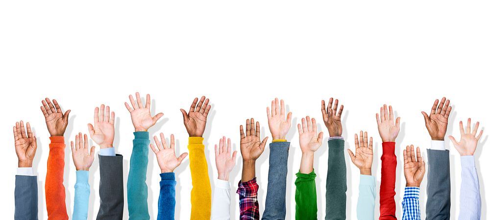 Group of Diverse Colorful Hands Raised