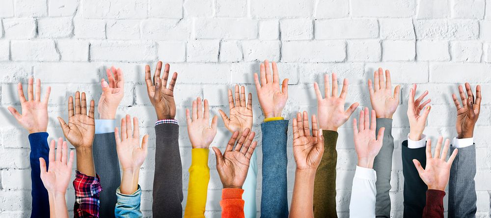 Group of Diverse People's Hands Raised