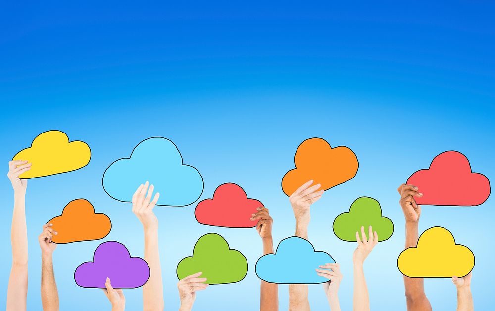 People Holding Colorful Cloud Symbols