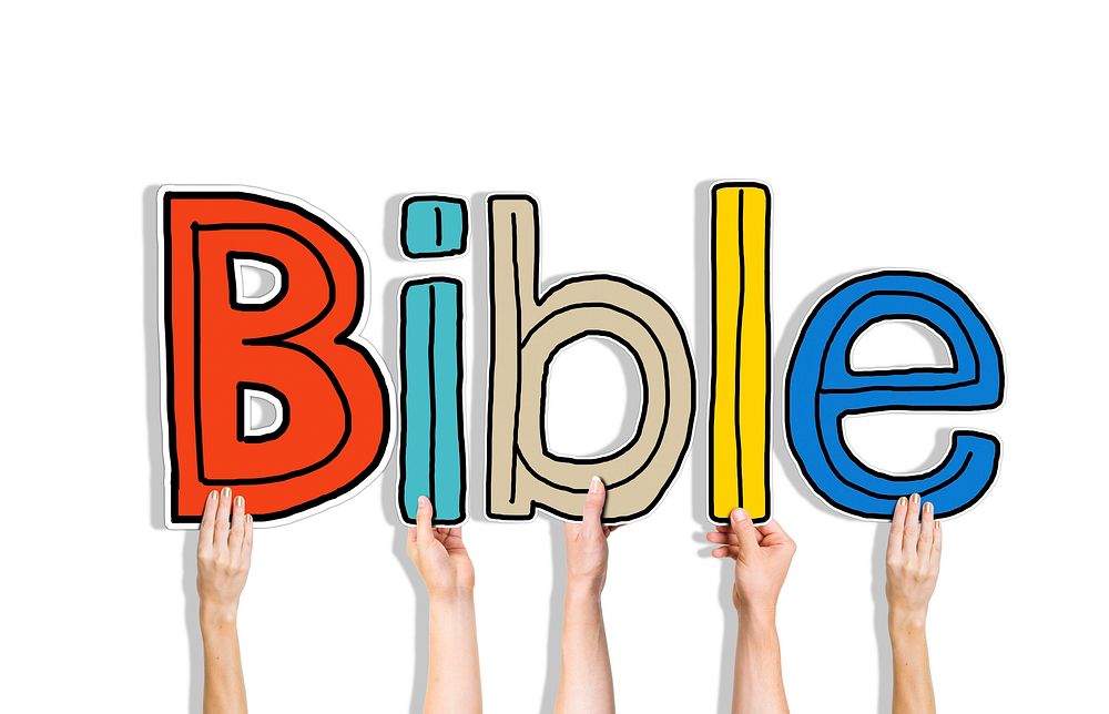 Diverse Hands Holding the Word Bible