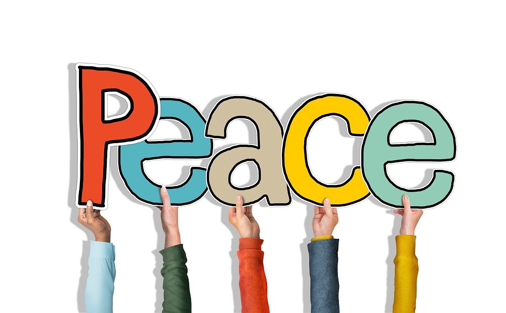Group of Diverse People's Hands Holding Peace