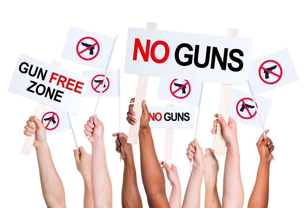 People campaigning for gun free zone.