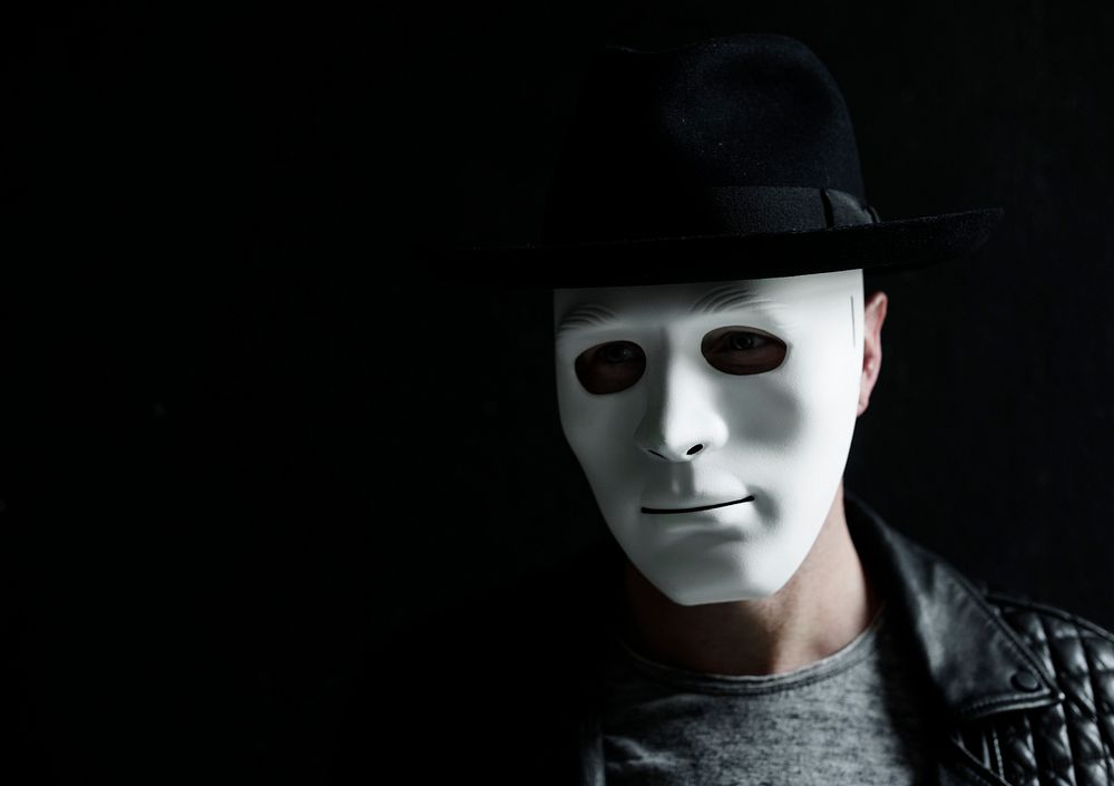 Person wearing white mask anonymous