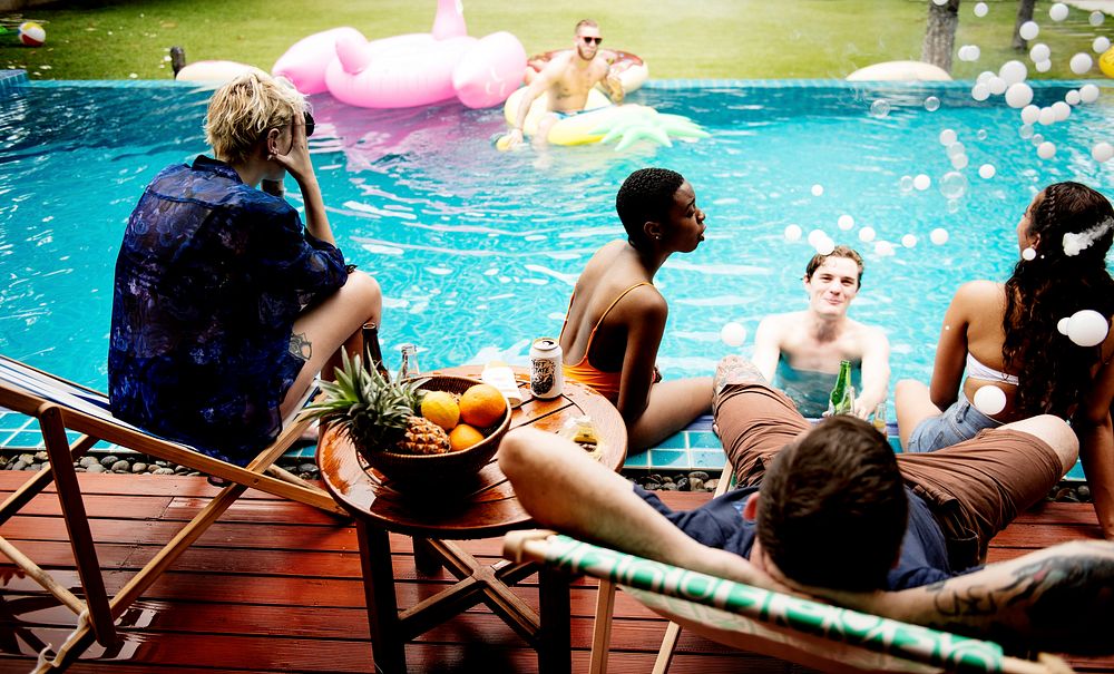 Group of diverse friends enjoying the pool